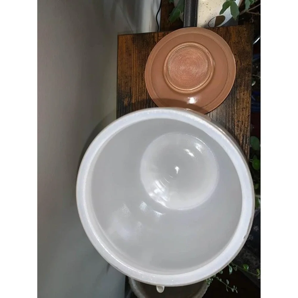 Vintage Bartlett Collins milk glass cookie jar featuring gingerbread man design